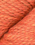 Close-up of pinkish orange yarn with visible texture