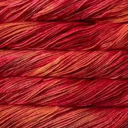 Close-up of red yarn with a gradient effect