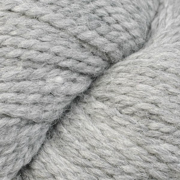 Close-up of light gray yarn.