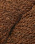 Close-up of brown yarn with visible texture