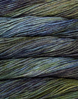 Close-up of green and blue yarn skeins