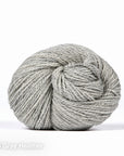 058 Gray Heather. a skein of medium-light gray heather DK weight yarn.