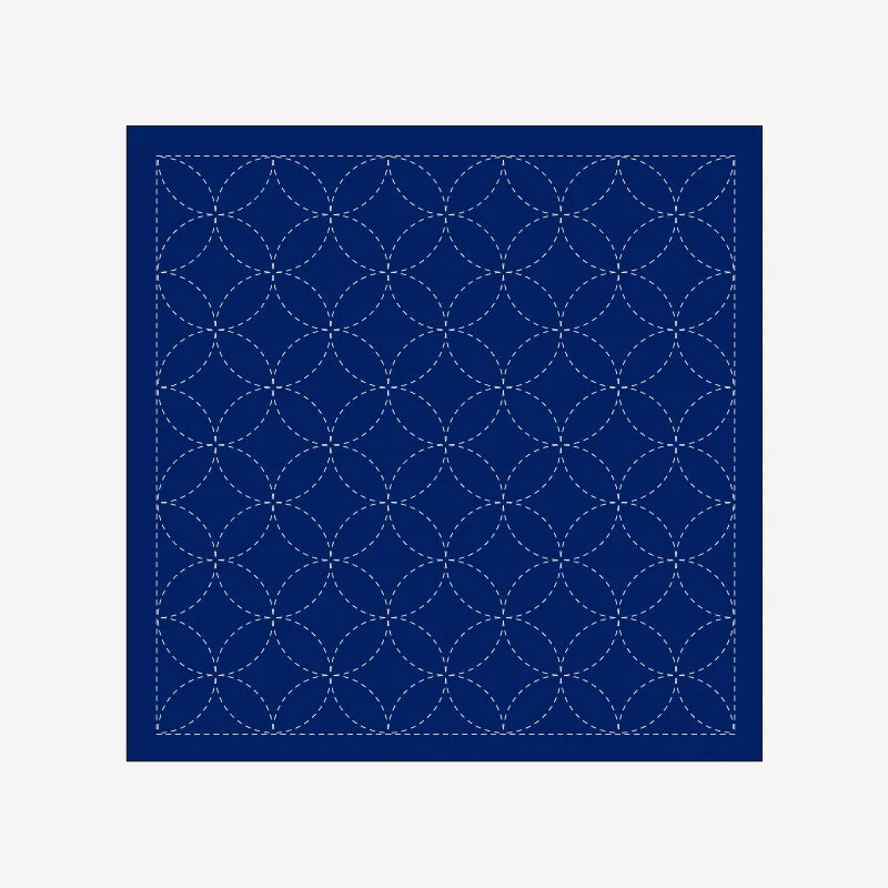 Navy blue fabric with white geometric pattern on a light gray background