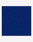 Blue fabric with a geometric pattern on a white background