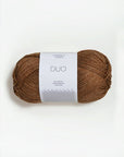 Brown skein of yarn with a label on a white background