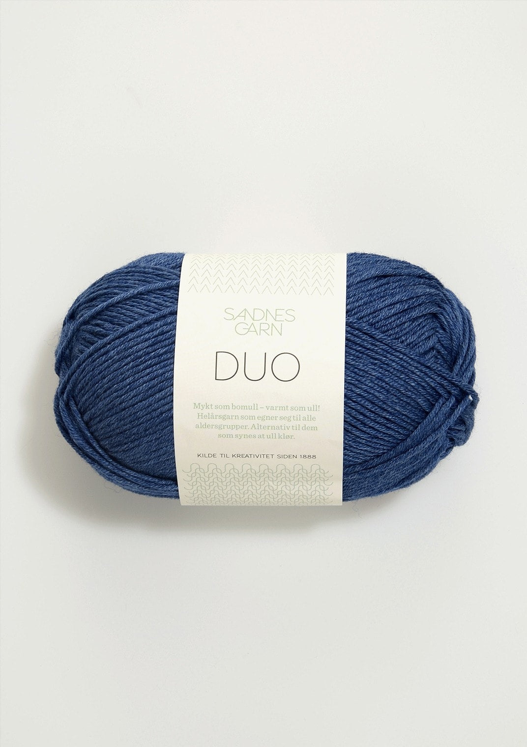 Blueprint blue skein of yarn with a label on a white background