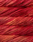 Close-up of red yarn with a gradient effect