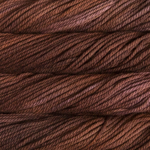 Close-up of brown yarn with visible texture