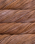 Close-up of brown & mauve yarn strands