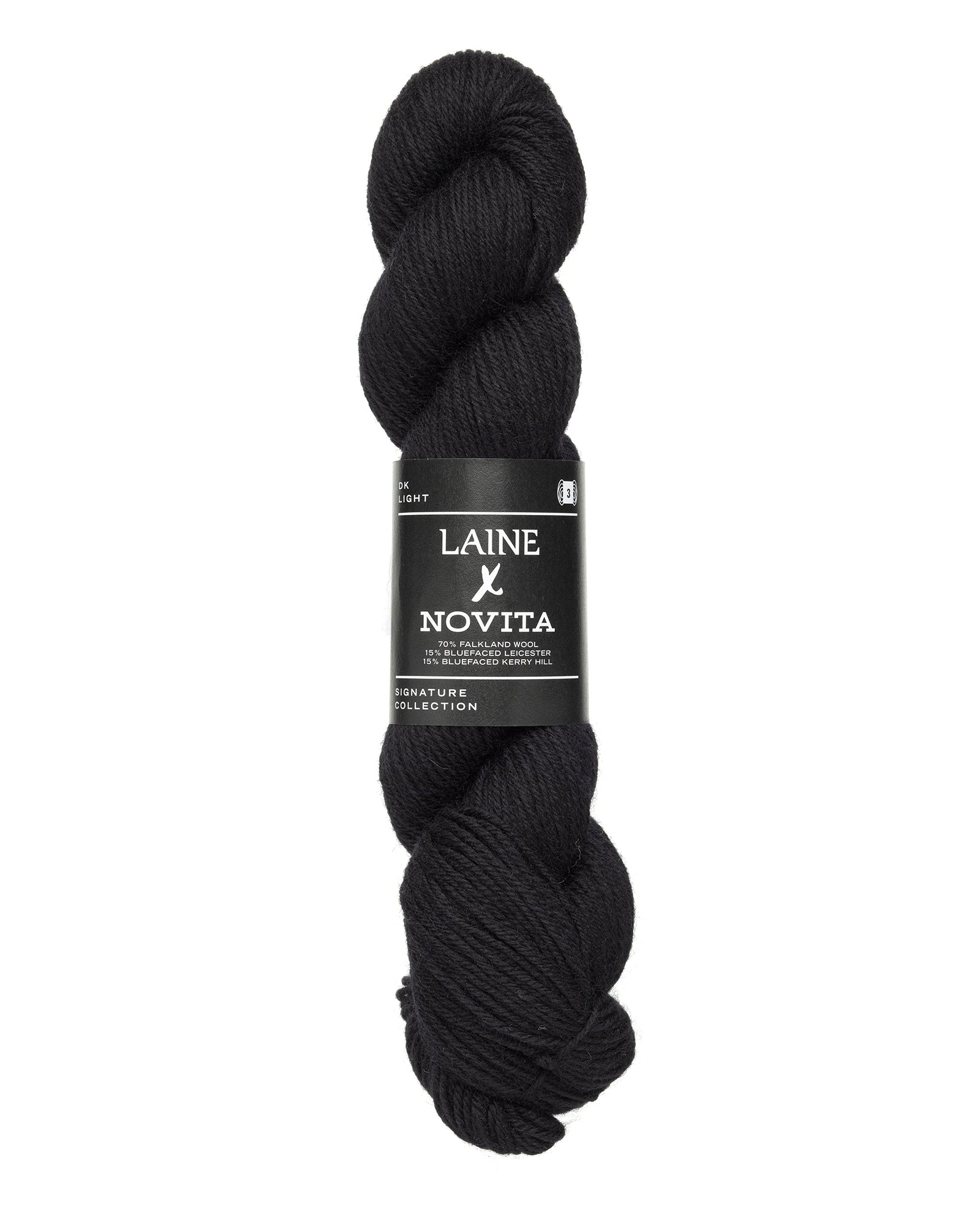 Black skein of yarn with Laine Novita label on a white background